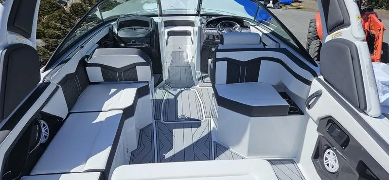 Slide: The Image of 2024 Monterey 258 boat interior with modern seating and sleek design. - 7