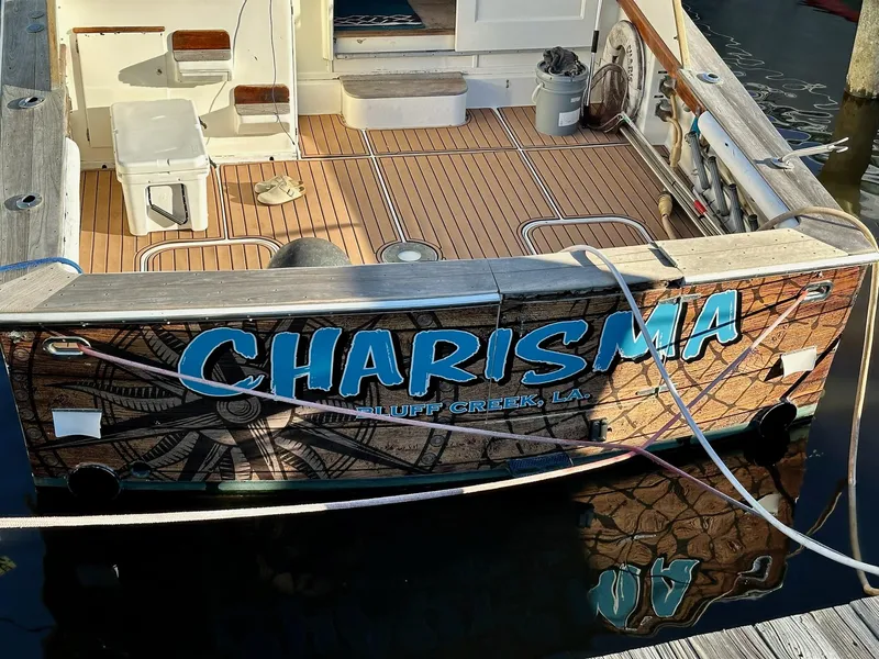 Slide: The Image of 1987 Post 46 SPORT boat named "Charisma" docked at Bluff Creek, LA. - 28