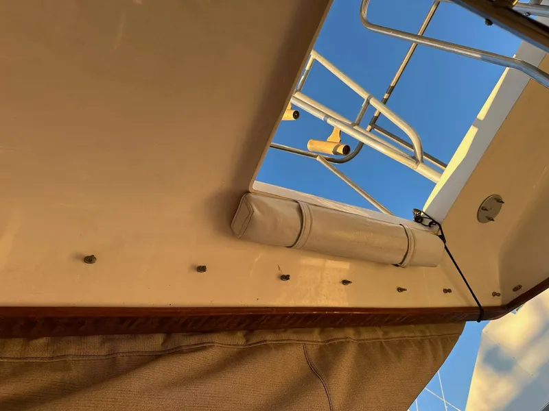 Slide: The Image of View of 1987 Post 46 SPORT boat deck with railing against blue sky. - 9