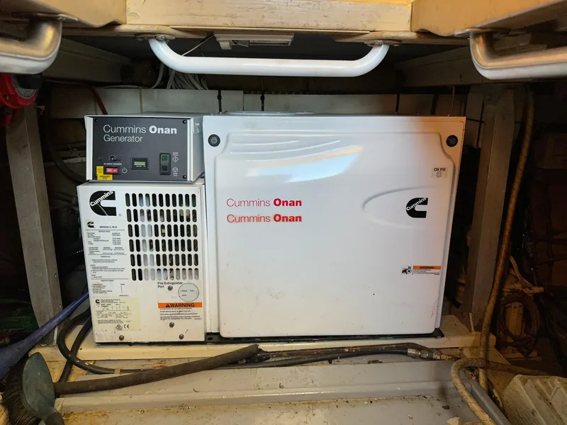 Slide: The Image of Cummins Onan generator in 1987 Post 46 SPORT boat engine room. - 31