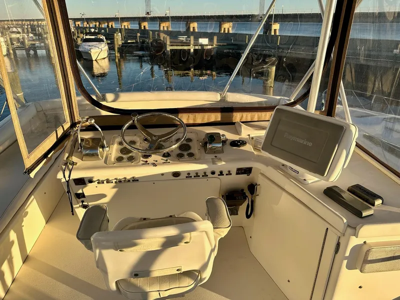 Slide: The Image of Helm of 1987 Post 46 SPORT yacht with steering wheel and navigation equipment. - 5