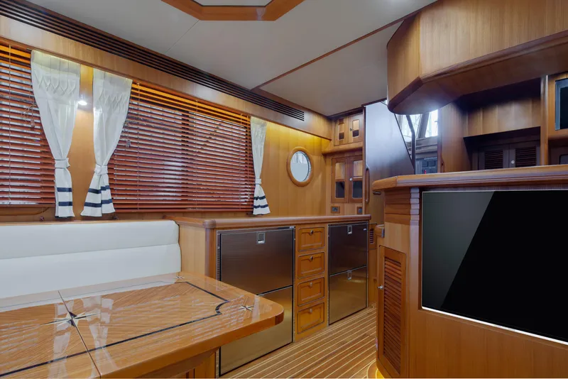 Slide: The Image of Luxurious interior of 2026 Selene 49 Classic Explorer yacht with wood finishes and modern amenities. - 10