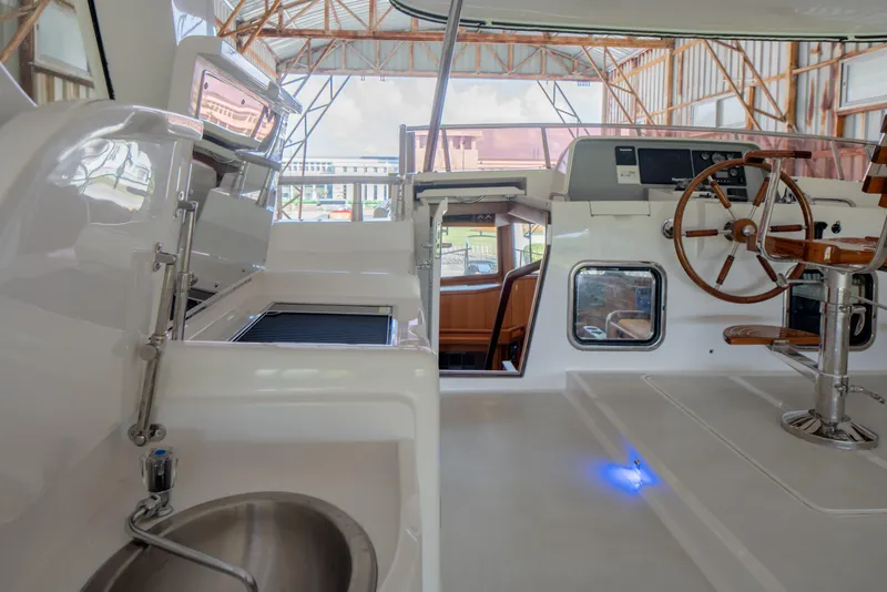 Slide: The Image of Interior view of 2026 Selene 49 Classic Explorer yacht with helm and seating area. - 26