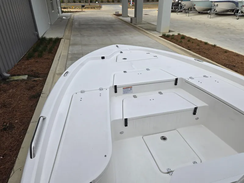 Slide: The Image of 2024 Sea Fox 251 Bay Fox boat deck with storage compartments. - 11