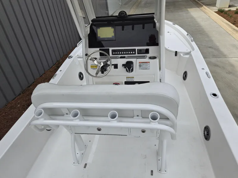 Slide: The Image of 2024 Sea Fox 251 Bay Fox boat interior with console and seating. - 7