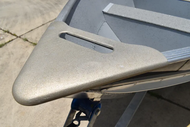 Slide: The Image of Bow of 2024 Lowe WV 1470 boat on trailer, showing metallic finish. - 14