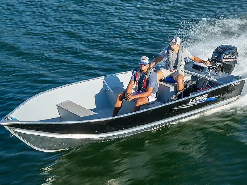 Slide: The Image of 2024 Lowe WV 1670 boat cruising on water with two passengers. - 12
