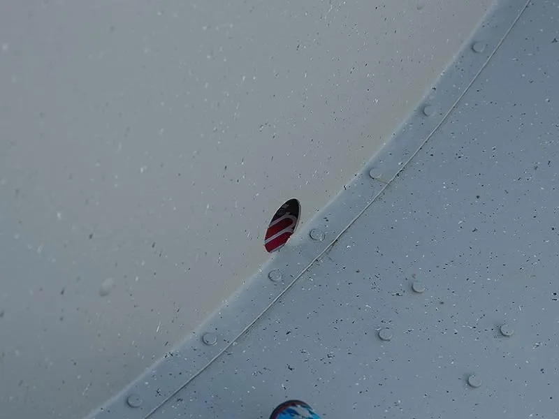 Slide: The Image of Close-up of 2024 Lowe WV 1670 boat hull with rivets and drain plug. - 9