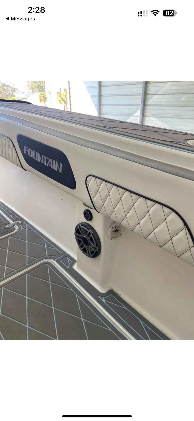 Slide: The Image of 2007 Fountain 38 CC Tournament Edition boat interior with speaker and quilted upholstery. - 15