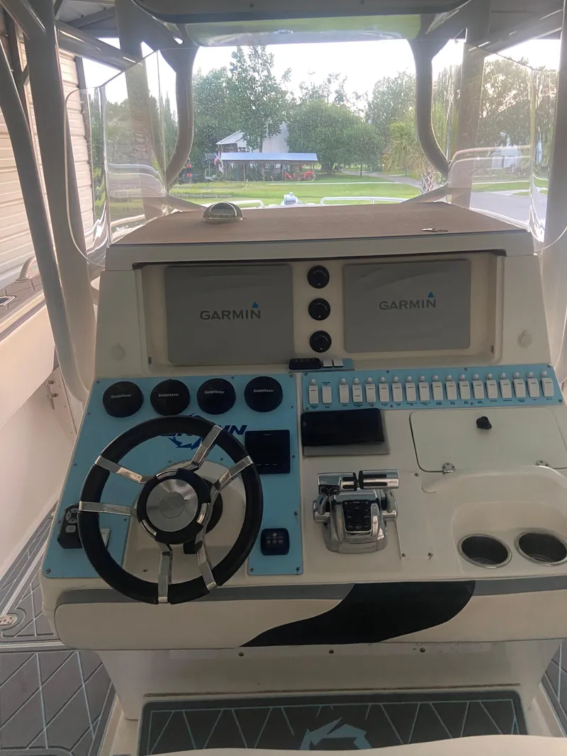 Slide: The Image of 2007 Fountain 38 CC Tournament Edition boat helm with Garmin navigation system. - 3