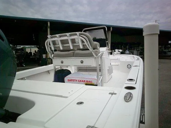 Slide: The Image of 2023 Sportsman Masters 207 boat with safety gear bag on deck. - 3