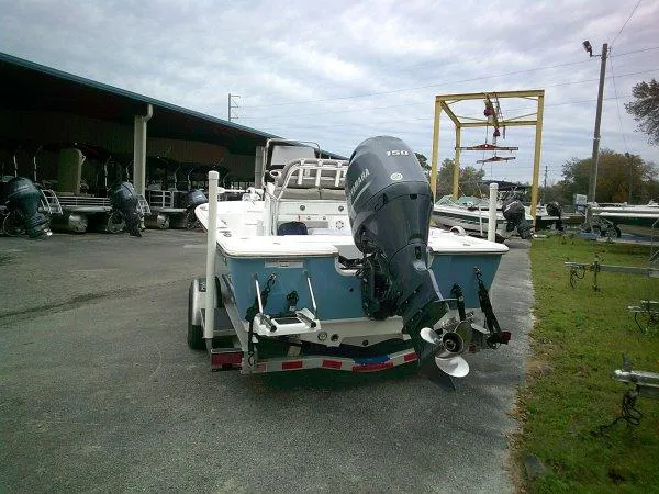 Slide: The Image of 2023 Sportsman Masters 207 boat with Yamaha outboard motor on trailer. - 4