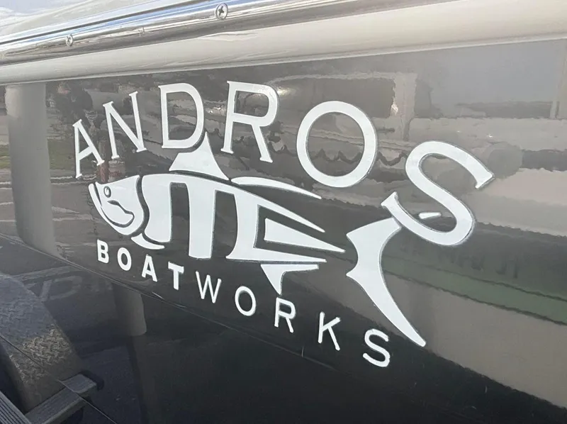 Slide: The Image of Andros Boatworks logo on 2014 Andros Tarpon 26 boat. - 2