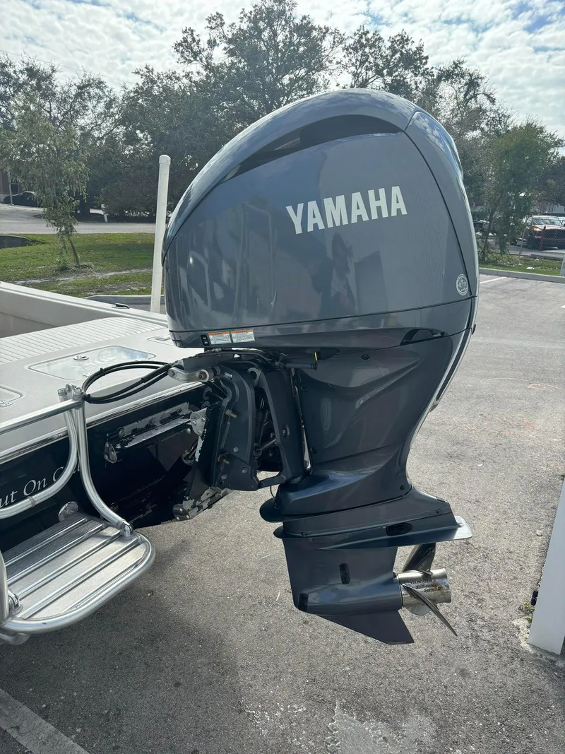 Slide: The Image of 2014 Andros Tarpon 26 with Yamaha outboard motor. - 22