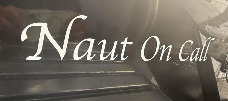 Slide: The Image of Naut On Call text on 2014 Andros Tarpon 26 boat. - 3