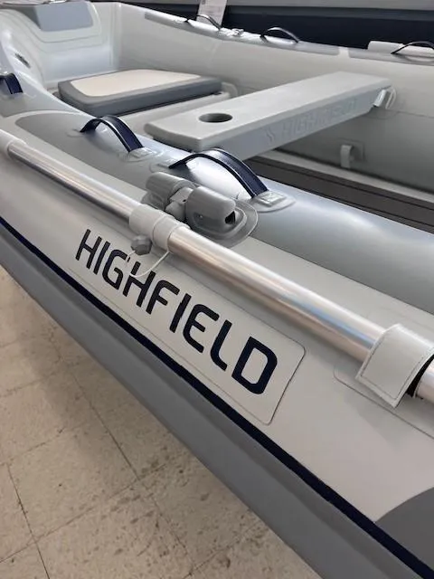 Slide: The Image of 2024 Highfield Classic 310 inflatable boat interior with seating and oar holders. - 4