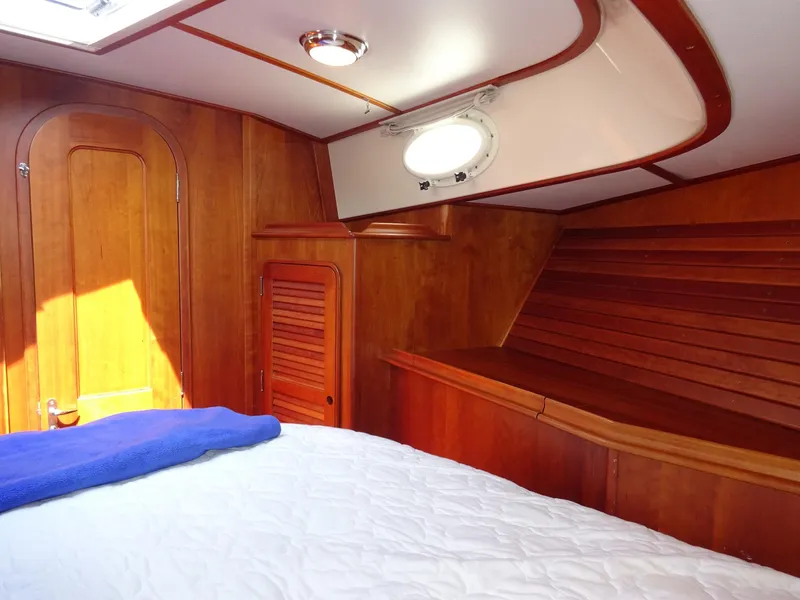 Slide: The Image of Interior cabin of 2002 Hinckley Talaria 44 FB yacht with wooden finish. - 30