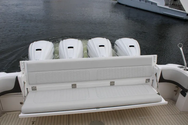 Slide: The Image of 2020 Intrepid 475 Sport Yacht with quad outboard engines and rear seating. - 15