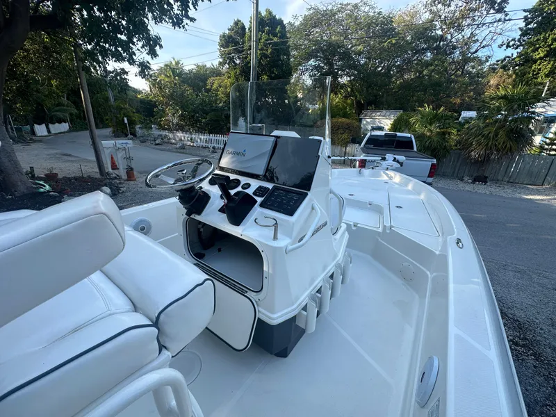 Slide: The Image of 2021 Skeeter SX 2250 boat interior with steering console and seating. - 3