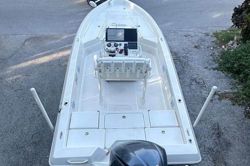 Slide: The Image of 2021 Skeeter SX 2250 boat with center console and outboard motor. - 31