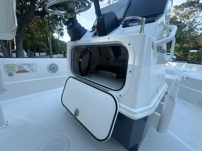Slide: The Image of 2021 Skeeter SX 2250 boat with open storage compartment on deck. - 4