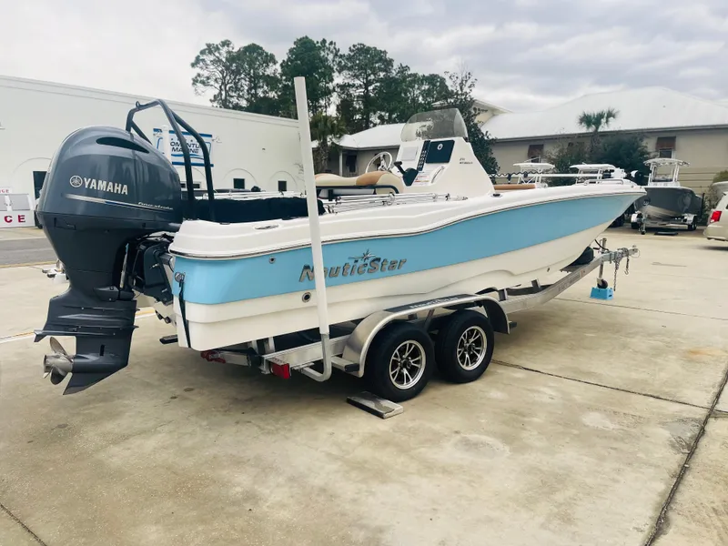 Slide: The Image of 2023 NauticStar 2110 Nautic Bay boat on trailer with Yamaha outboard motor. - 3