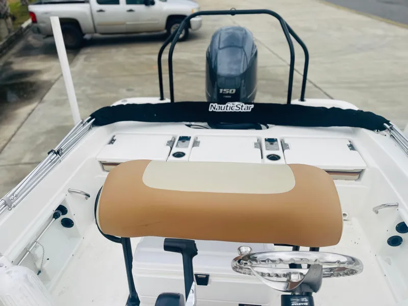 Slide: The Image of 2023 NauticStar 2110 Nautic Bay boat with Yamaha 150 engine, rear view. - 8