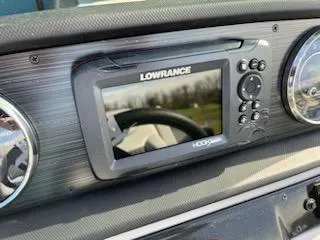 Slide: The Image of Lowrance display on 2024 Godfrey 2286sfl boat dashboard. - 7