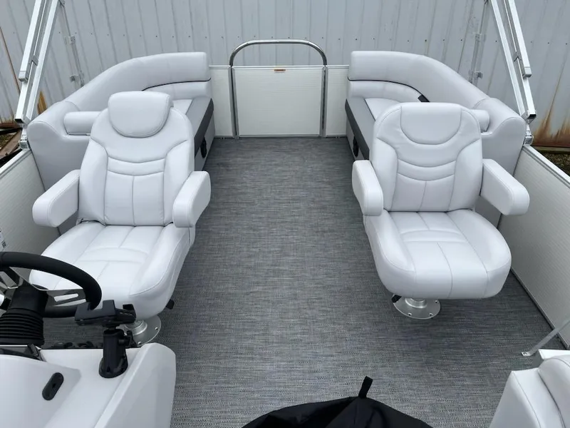 Slide: The Image of 2024 Godfrey 2286SB pontoon boat interior with white leather seats. - 12