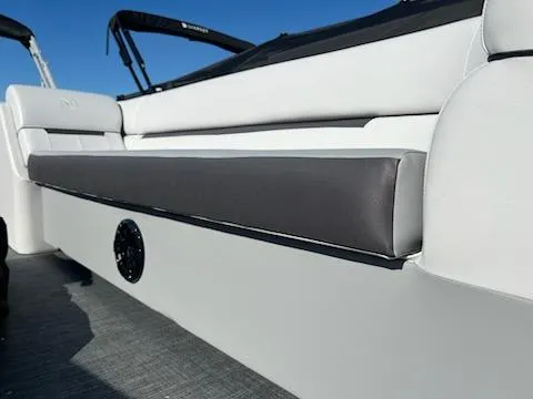Slide: The Image of 2024 Godfrey 2286SB boat interior seating with speaker. - 5