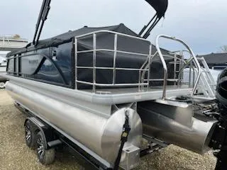 Slide: The Image of 2024 Godfrey 2286sfl pontoon boat with black canopy and silver railing. - 11