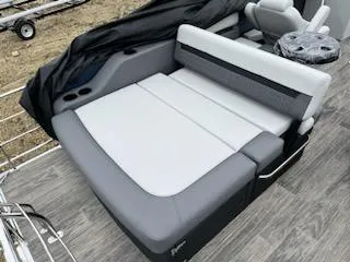 Slide: The Image of 2024 Godfrey 2286sfl boat with gray and white seating area. - 4