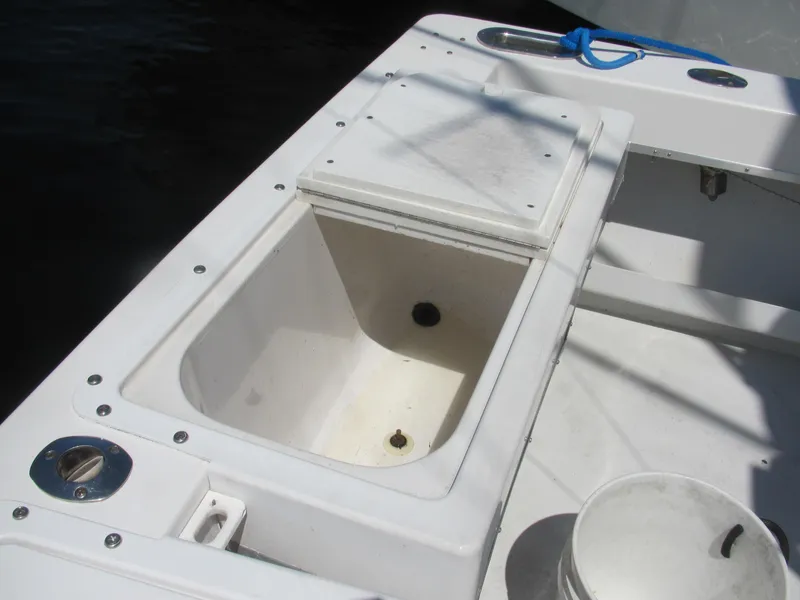 Slide: The Image of Open storage compartment on 1997 Island Hopper 30 Open boat deck. - 17