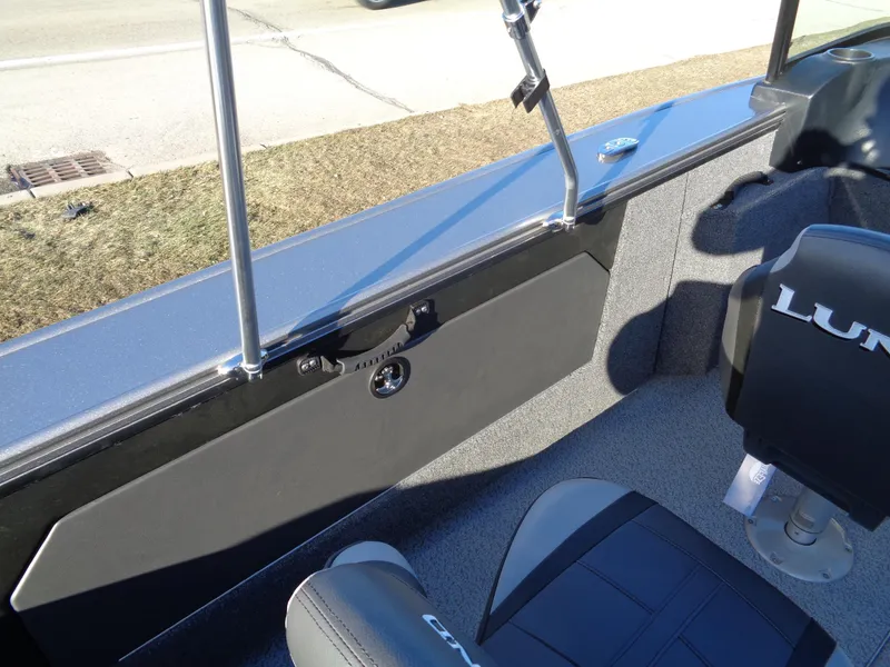 Slide: The Image of 2024 Lund 1875 Fisherman boat interior with seating and railing. - 16