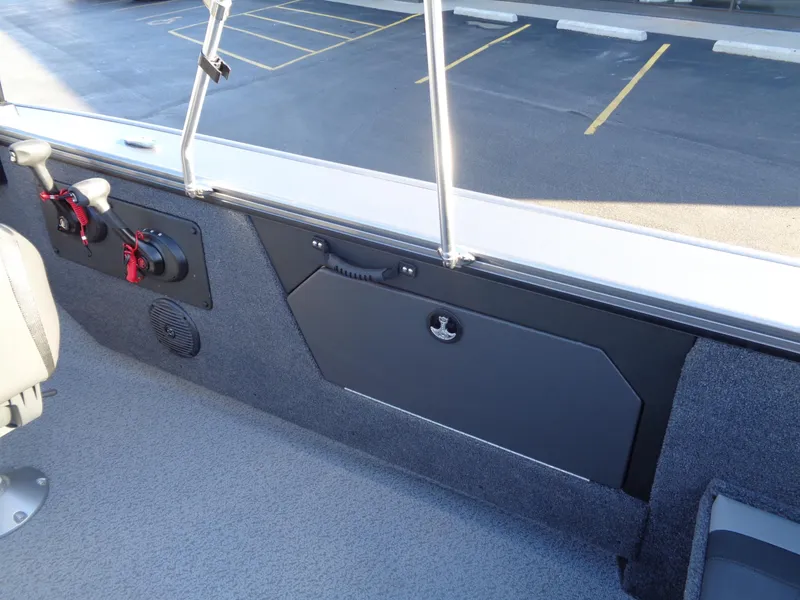 Slide: The Image of 2024 Lund 1875 Fisherman interior with storage compartment and seating. - 19