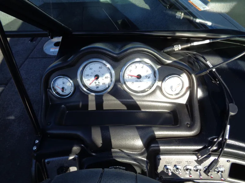Slide: The Image of Dashboard of 2024 Lund 1875 Fisherman boat with gauges and controls. - 24