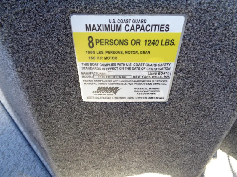 Slide: The Image of 2024 Lund 1875 Fisherman capacity label: 8 persons or 1240 lbs, 150 HP motor. - 31