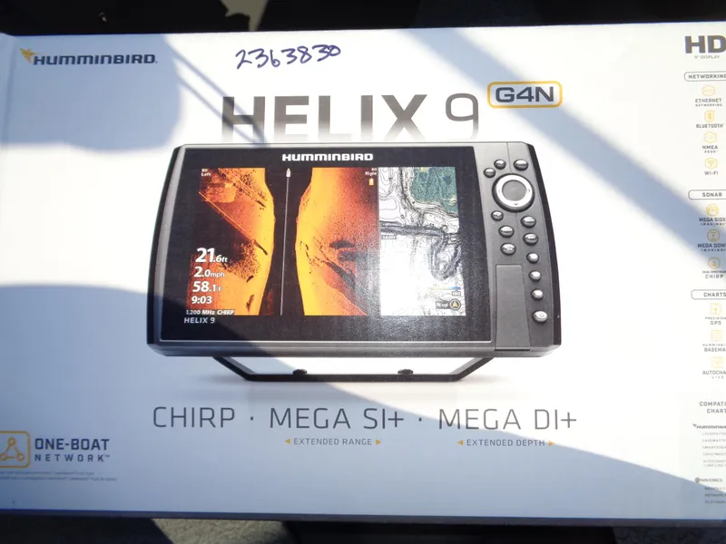 Slide: The Image of Humminbird Helix 9 G4N fish finder packaging with CHIRP, MEGA SI+, and MEGA DI+ features. - 33