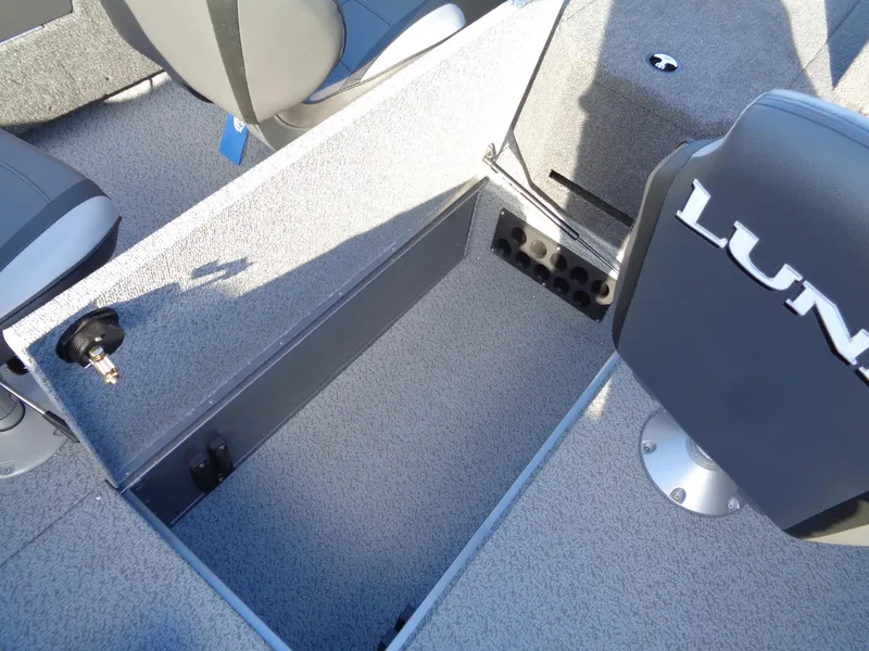 Slide: The Image of 2024 Lund 1875 Fisherman boat interior with storage compartment open. - 34