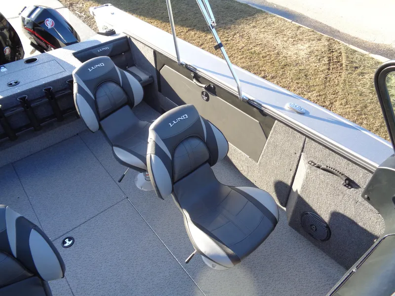 Slide: The Image of 2024 Lund 1875 Fisherman boat interior with comfortable seating and modern design. - 41