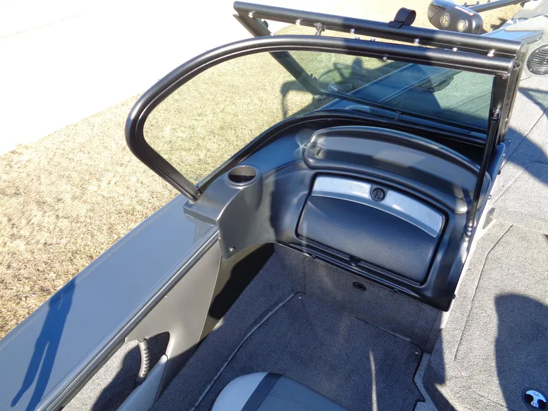 Slide: The Image of 2024 Lund 1875 Fisherman boat interior with windshield and seating area. - 44