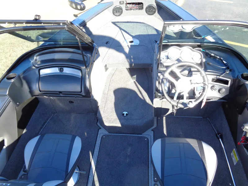 Slide: The Image of 2024 Lund 1875 Fisherman boat interior with dual seats and steering console. - 46