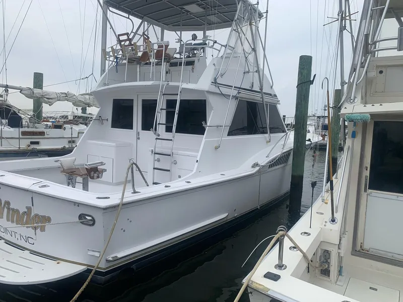 The Image of 1974 Hatteras 46 Convertible yacht docked at marina. - 0