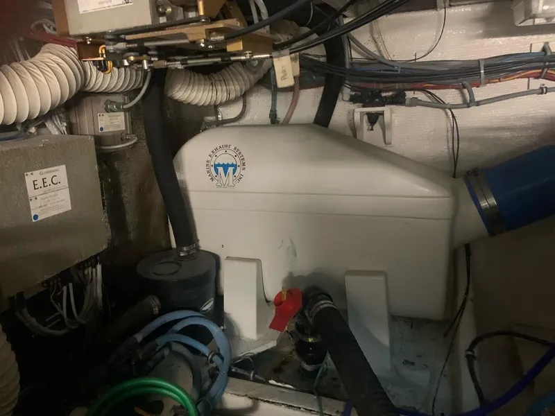 Slide: The Image of Engine room of 1974 Hatteras 46 Convertible with marine equipment and wiring. - 22