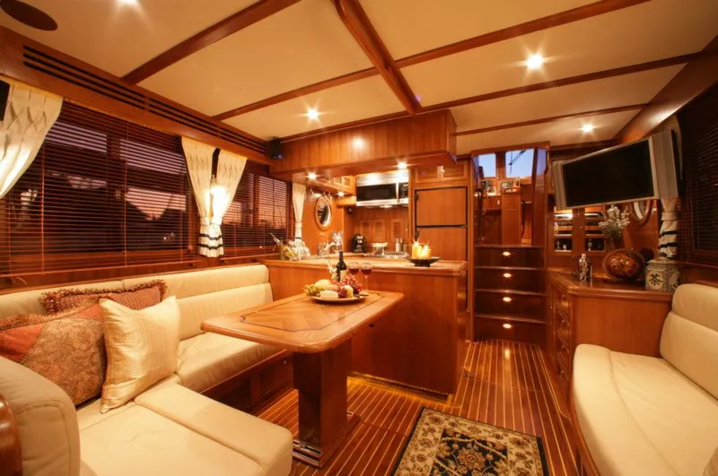 Slide: The Image of Luxurious interior of 2026 Selene 45 Classic Explorer yacht with elegant wood finishes. - 11