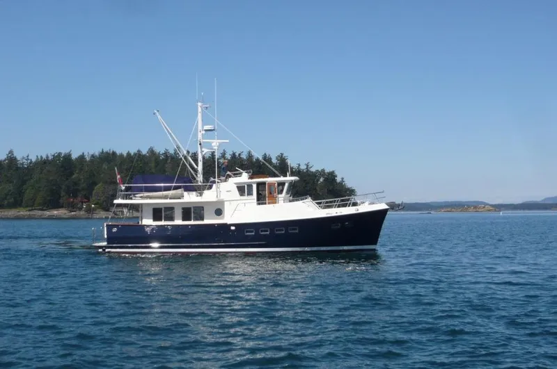 Slide: The Image of Selene 45 Classic Explorer yacht cruising on a calm sea, 2026 model. - 6