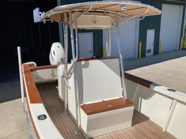 Slide: The Image of 2014 Custom 24' Center Console boat with T-top and wooden deck. - 13