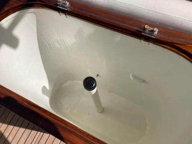 Slide: The Image of Open livewell in 2014 Custom 24' Center Console boat. - 15