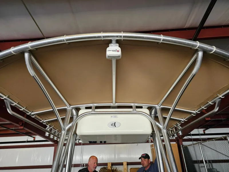 Slide: The Image of 2014 Custom 24' Center Console boat with T-top and radar, indoor storage. - 22