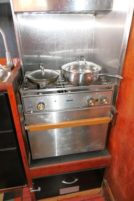 Slide: The Image of Vintage Choate Custom 38 yacht kitchen stove with pots, 1976 model. - 18